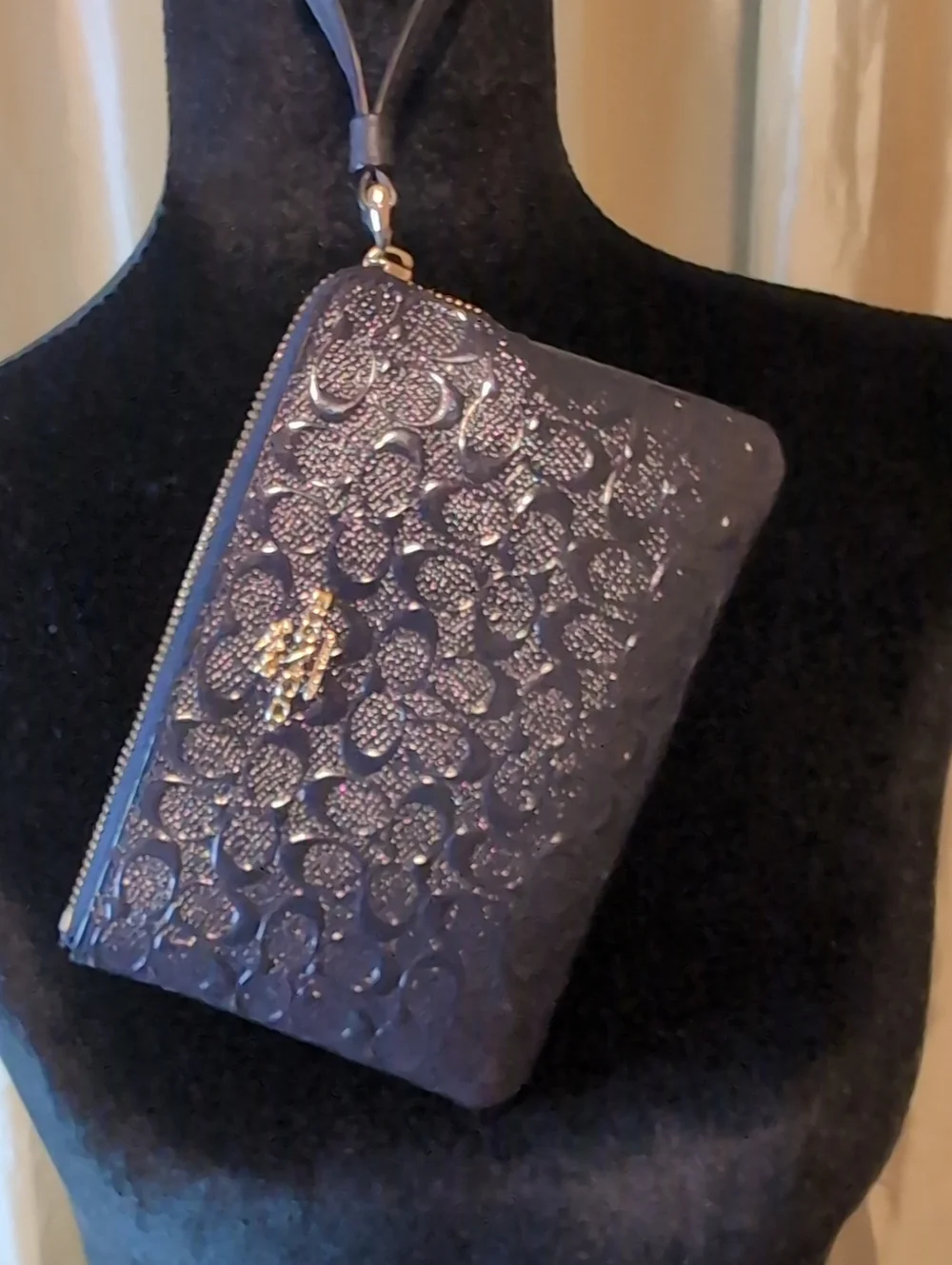 Coach wristlet embossed